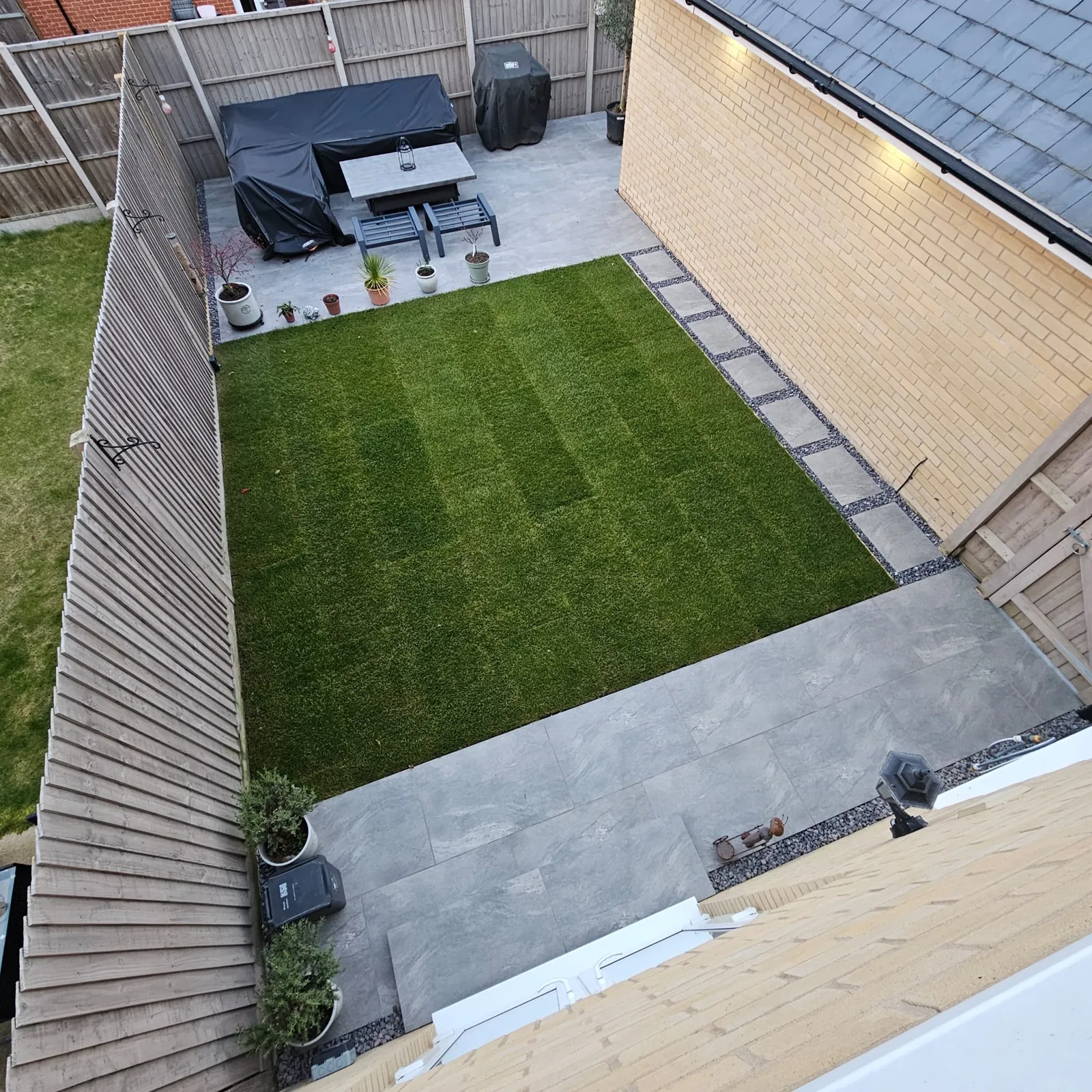 Artificial grass lawn installed by Spruce Brothers in Aldershot, Hampshire